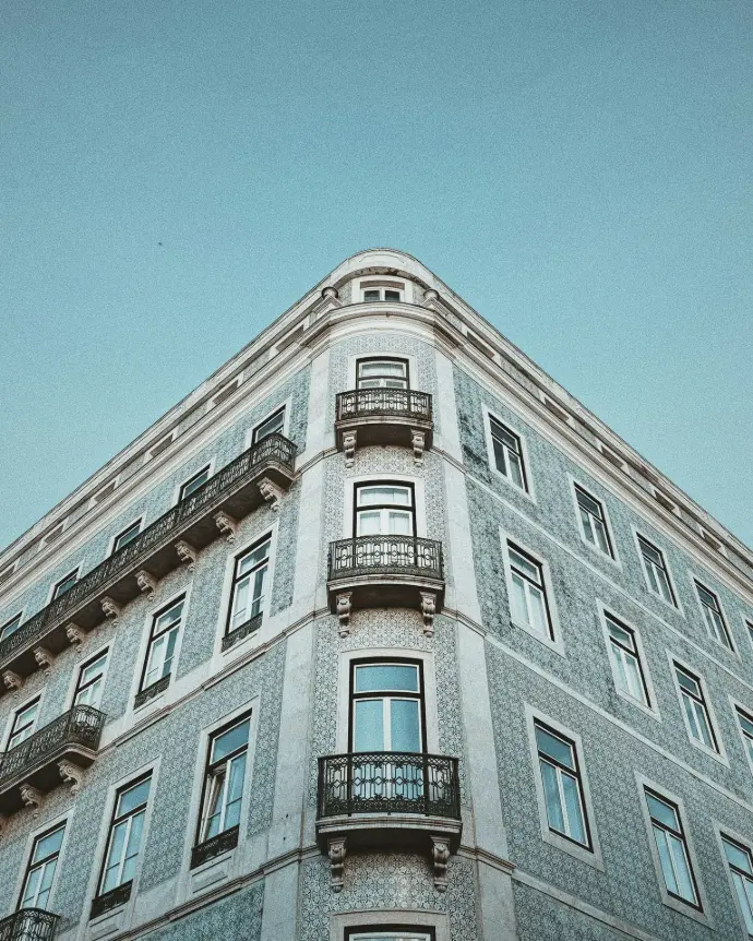 white concrete building under blue sky during daytime
